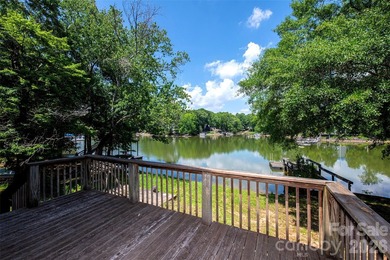 Welcome to this 4-bedroom, 3-bathroom waterfront retreat on the - photo 41