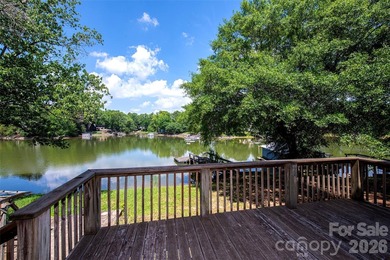 Welcome to this 4-bedroom, 3-bathroom waterfront retreat on the - photo 42