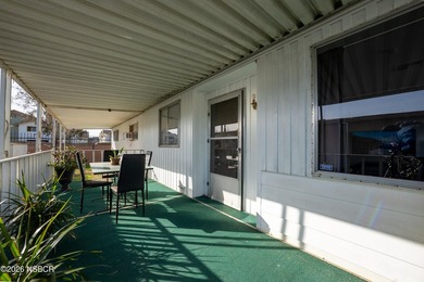 This beautifully updated manufactured home located in the - photo 4