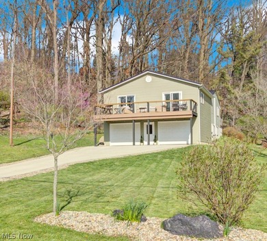 This beautifully updated 4 bedroom, 3 bath home at Lake Mohawk - photo 1