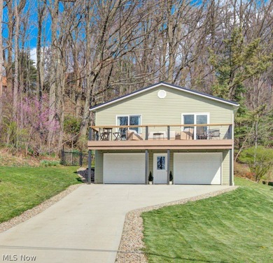 This beautifully updated 4 bedroom, 3 bath home at Lake Mohawk - photo 2