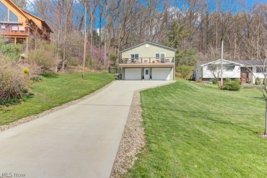 This beautifully updated 4 bedroom, 3 bath home at Lake Mohawk - photo 3