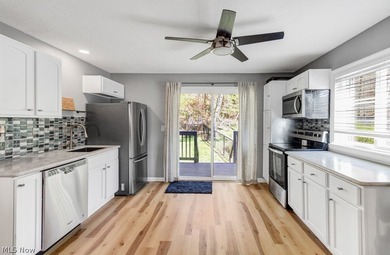 This beautifully updated 4 bedroom, 3 bath home at Lake Mohawk - photo 8