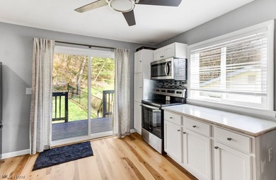This beautifully updated 4 bedroom, 3 bath home at Lake Mohawk - photo 10