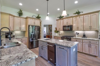 Welcome to this stunning stone and stucco Mediterranean-style