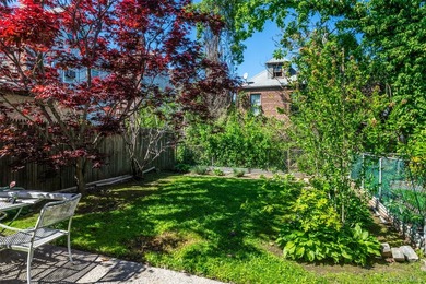 Welcome to this solid brick, detached single-family home in - photo 4