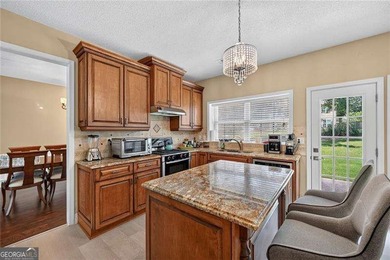 Welcome to 11765 Crossington Road, where timeless elegance meets - photo 6