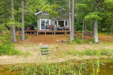Set along the peaceful shoreline of Vermillion Lake, this - photo 1
