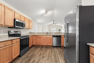 Welcome home! Located in the gated community of Emerald Lakes in - photo 4
