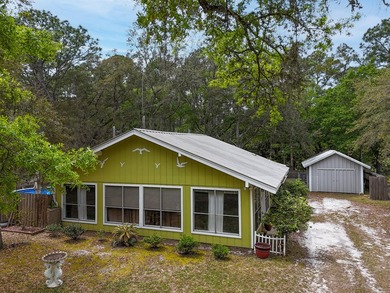 Tucked away in the heart of Santa Rosa Beach, this charming and - photo 2