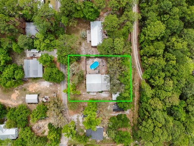 Tucked away in the heart of Santa Rosa Beach, this charming and - photo 3