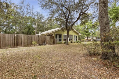 Tucked away in the heart of Santa Rosa Beach, this charming and - photo 6