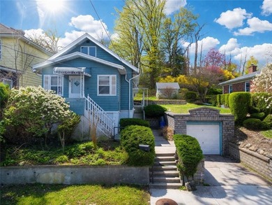 Nestled in the highly sought-after Dongan Hills Colony, this - photo 3