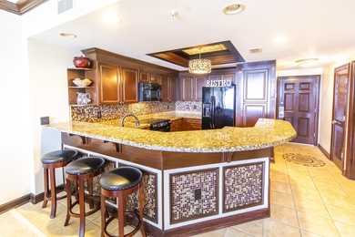 Located on a palm tree lined boulevard, Boardwalk Beach Resort - photo 17