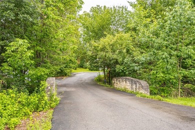 Welcome to this sprawling 2005-built ranch, privately nestled on - photo 3