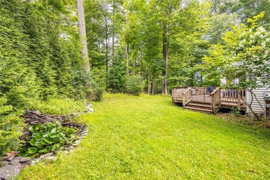 Welcome to this sprawling 2005-built ranch, privately nestled on - photo 4