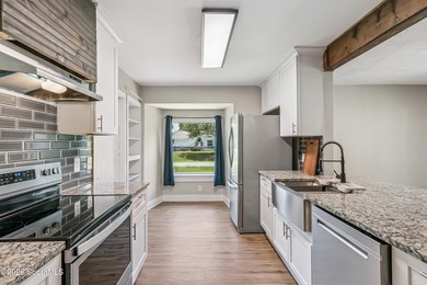Discover this beautifully updated 3 bedroom, 2 bathroom home - photo 10