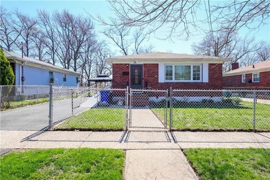Charming brick ranch-style single-family home located in the - photo 1