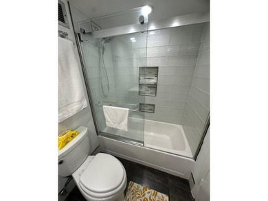 Tastefully updated with a distinctive, classy touch! This unit - photo 14