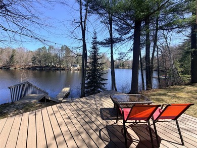 Nestled among mature pines and hardwoods, this adorable cabin - photo 6