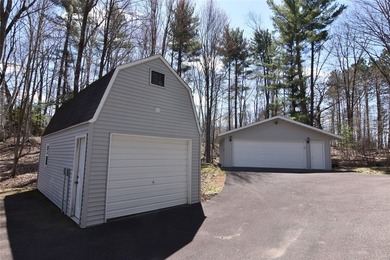 Nestled among mature pines and hardwoods, this adorable cabin - photo 10