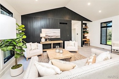 Stunning custom-built ranch home situated on 4.8 acres, just