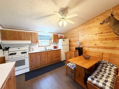 Wake up surrounded by the quiet beauty of the Northwoods, where - photo 5