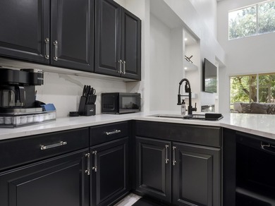 Completely remodeled 3-bedroom , 3-bathroom residence located in - photo 2