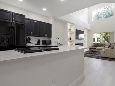 Completely remodeled 3-bedroom , 3-bathroom residence located in - photo 3