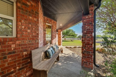 This well-maintained home sits on an expansive corner lot and - photo 3