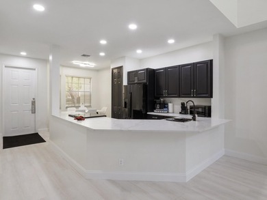 Completely remodeled 3-bedroom , 3-bathroom residence located in - photo 4