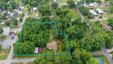 Check out this older home on almost an acre in the heart of town - photo 1