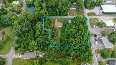 Check out this older home on almost an acre in the heart of town - photo 6