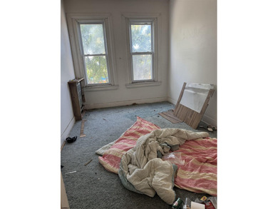 This property features a commercial space on the first floor - photo 3