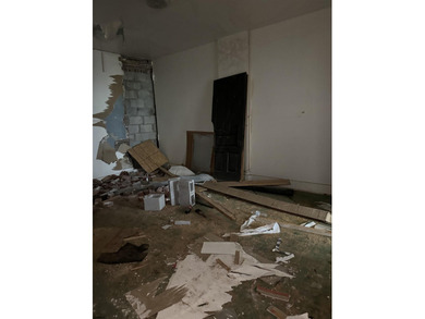 This property features a commercial space on the first floor - photo 8