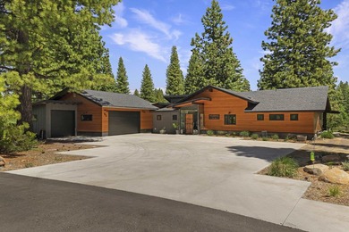 Modern mountain living meets golf course serenity in this - photo 2
