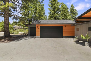 Modern mountain living meets golf course serenity in this - photo 4