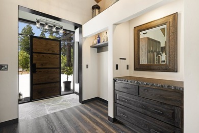 Modern mountain living meets golf course serenity in this - photo 6