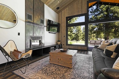 Modern mountain living meets golf course serenity in this - photo 9