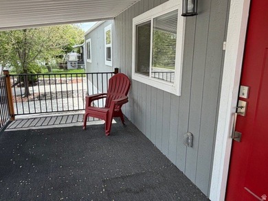 Practically new home in a desirable 55+ manufactured community - photo 11