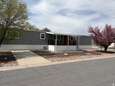Practically new home in a desirable 55+ manufactured community - photo 13