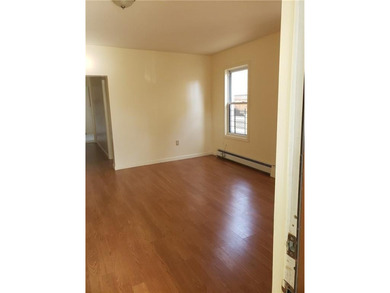 Welcome to a fully detached three-family residence nestled in - photo 3