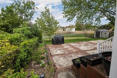 Welcome to this charming 4-bedroom, 2-full-bath Cape located in - photo 5
