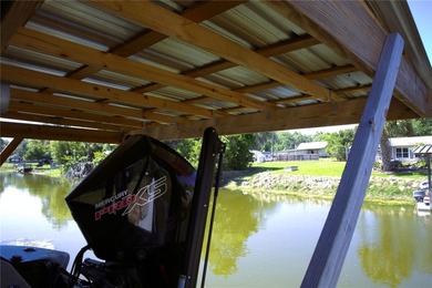Waterfront -- Situated on an oversized corner canal lot with - photo 11
