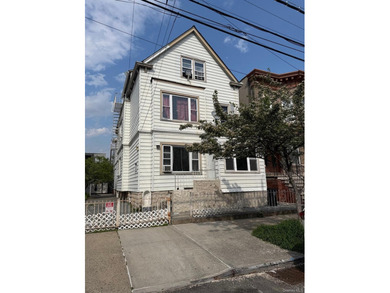 Investment Opportunity Reduced Price Legal 3-Family Detached 3BR - photo 1