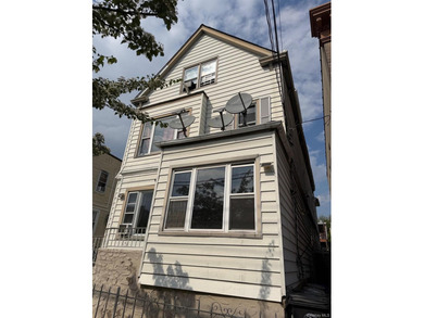 Investment Opportunity Reduced Price Legal 3-Family Detached 3BR - photo 2