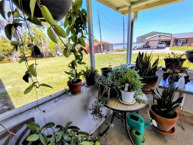 Waterfront -- Situated on an oversized corner canal lot with - photo 13