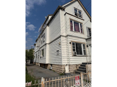 Investment Opportunity Reduced Price Legal 3-Family Detached 3BR - photo 3