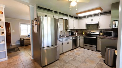 Waterfront -- Situated on an oversized corner canal lot with - photo 18