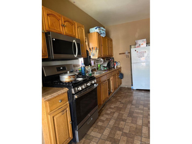 Investment Opportunity Reduced Price Legal 3-Family Detached 3BR - photo 10